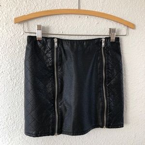 Divided black faux leather zip up mini shirt